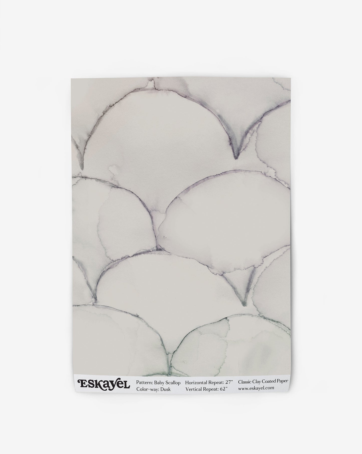 A white paper with a marble pattern on it from the Baby Scallop Wallpaper Dusk collection