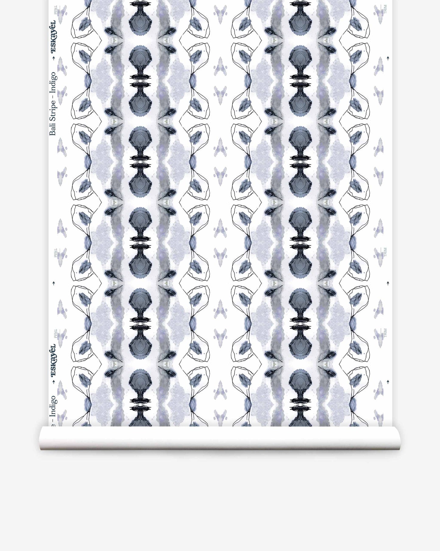 A roll of Bali Stripe Wallpaper||Indigo featuring a symmetrical blue and grey botanical pattern.