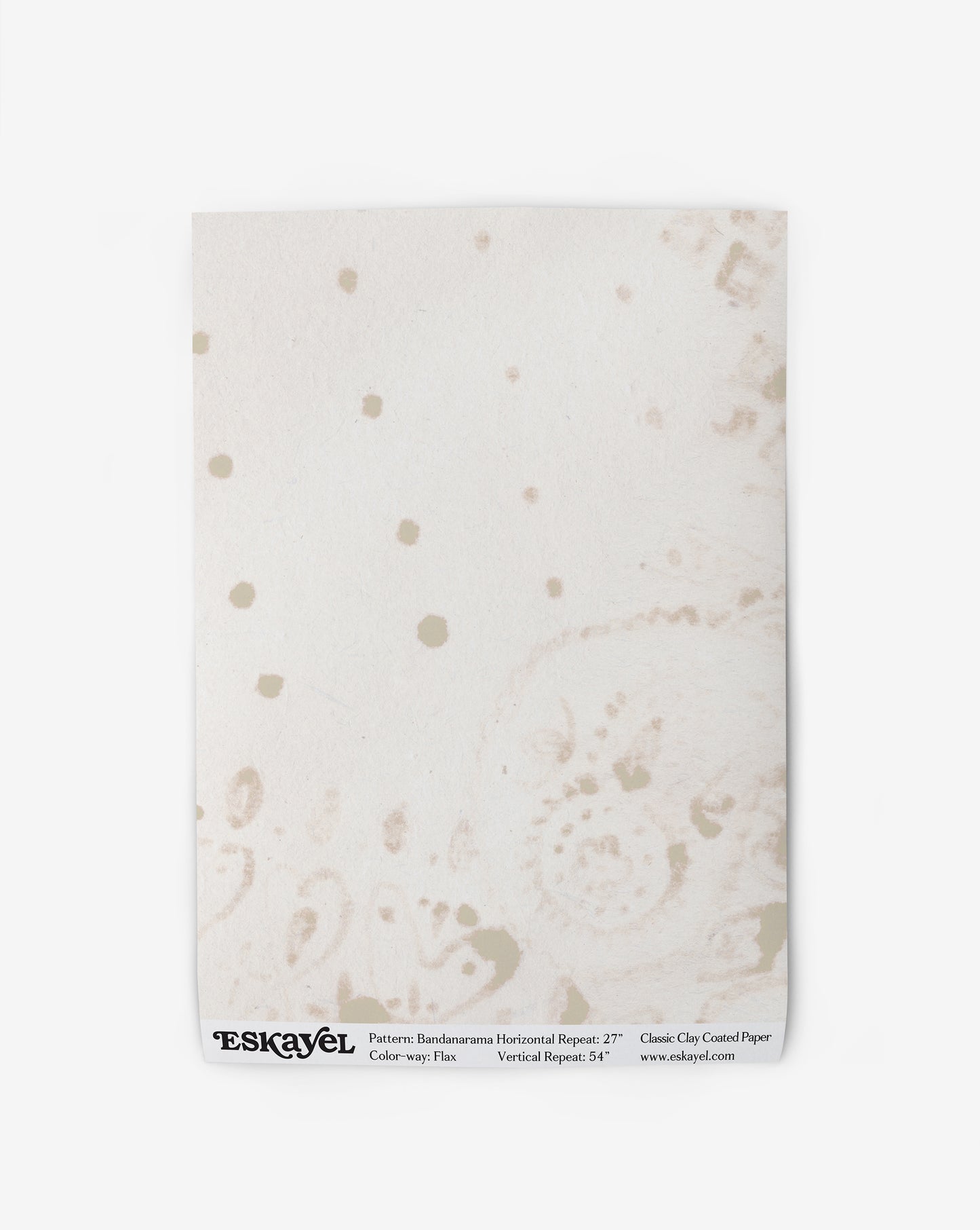 A white piece of Bandanarama Wallpaper flax with gold polka dots on it
