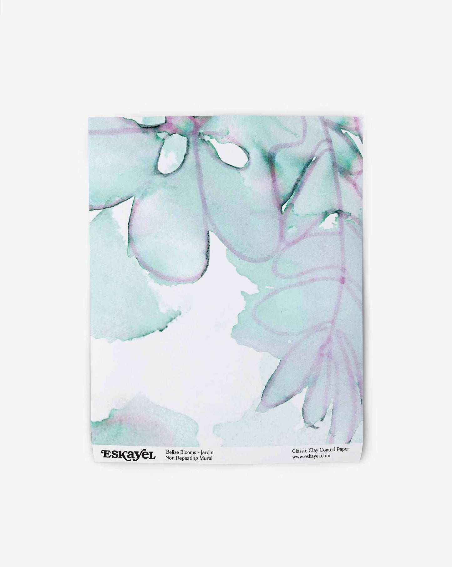 A luxury Belize Blooms Wallpaper Mural featuring a subtle floral watercolor design in shades of light green and pink, with the logo "Eskayel" at the bottom.