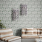 Eskayel's Cascade Tourmaline wallpaper in green shades installed in a living room.
