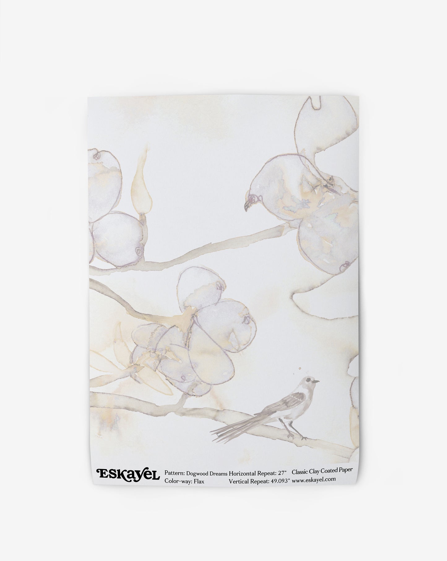 A custom tote bag in the Dogwood Dreams Wallpaper Flax design, featuring a bird on a branch in the beige Flax colorway
