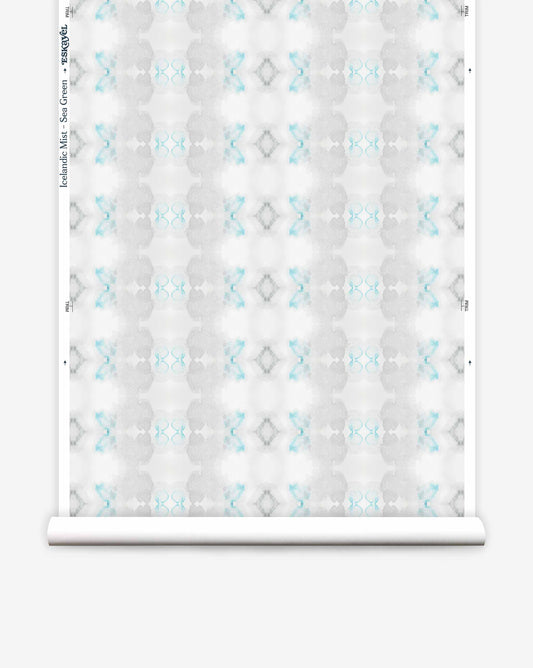 A luxurious Icelandic Mist Wallpaper in the Sea Green colorway on a roll of luxury wallpaper.