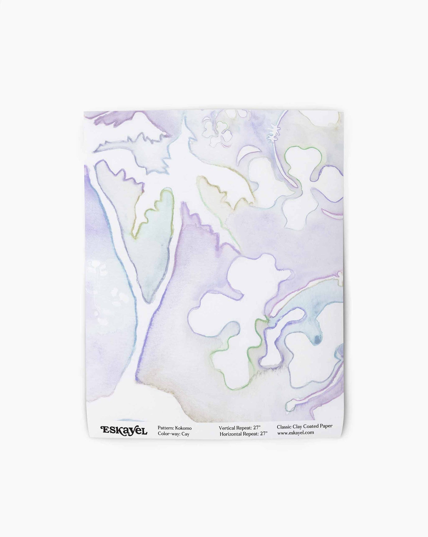 A swatch image of Kokomo's wallpaper in the colorway Cay with tones of purple.