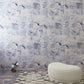 A room with Melting Checks Wallpaper Ocean, a playful ocean colorway and textured modern spirit