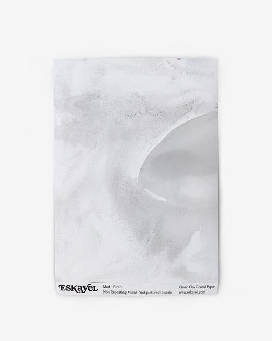 a sample of a Mod Mural Wallpaper Sample Birch with an image of a wave on it