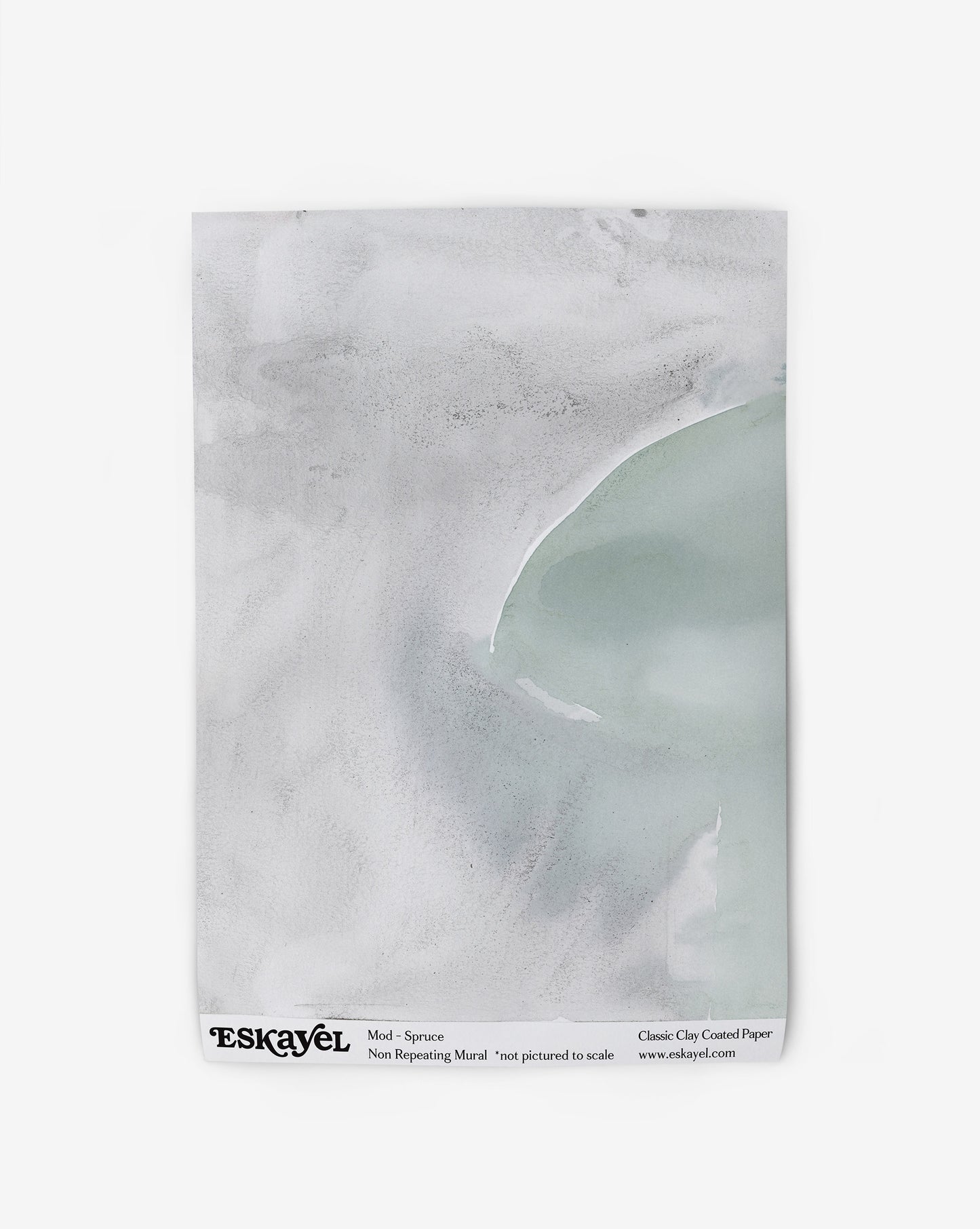 A white wallpaper with a green and atmospheric Mod Mural Wallpaper Spruce colorway design on it