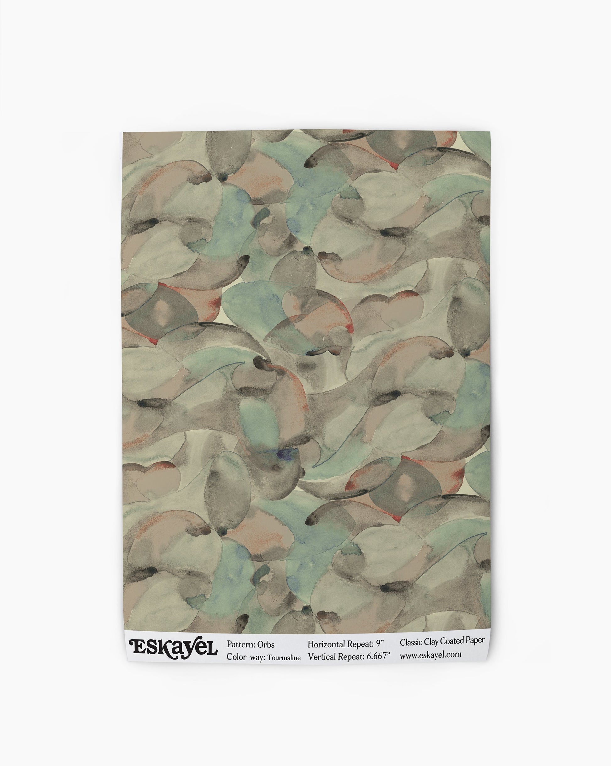 Orbs Wallpaper Sample in the color way tourmaline in shades of green.