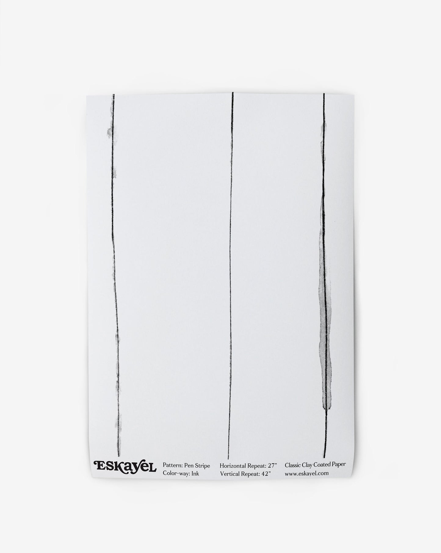 A white Pen Stripe Wallpaper Sample with a drawing on it is a sample