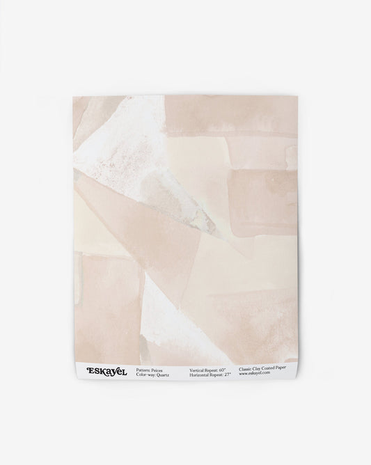 Our Pieces Wallpaper in Quartz has a color blocked design  of puzzle pieces in shades of pink.