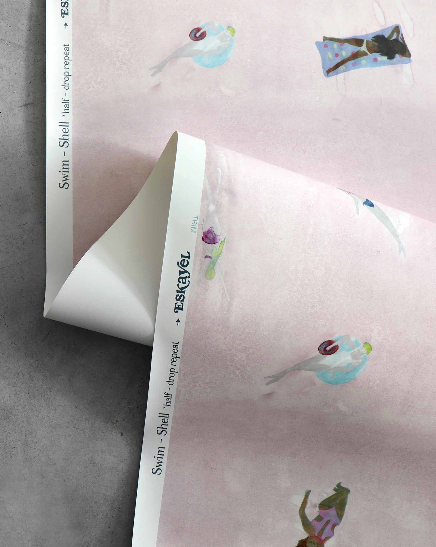 A closeup image of Swim Shell Wallpaper with its light blues background and waterborne female figures throughout.
