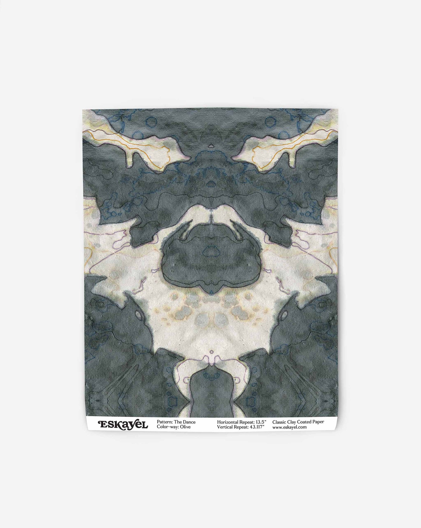A beige and green pattern on a swatch of wallpaper