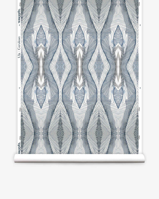 Intricate Ula Wallpaper||Cerulean symmetrical pattern displayed on a rolled-out luxurious wallpaper against a white background.