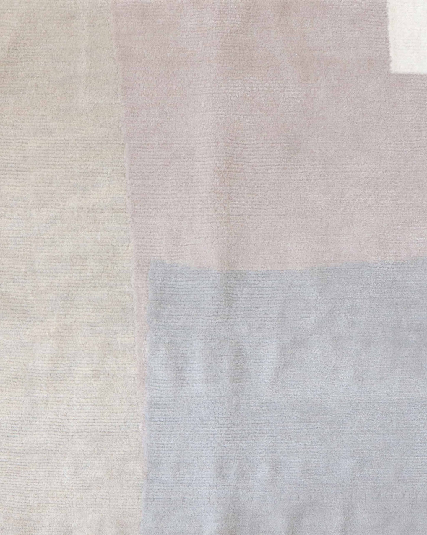 A close up image of the Blocked rug in Cloud.