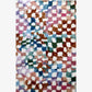 A colorful Chess Hand Knotted Rug Multi with a checkered pattern