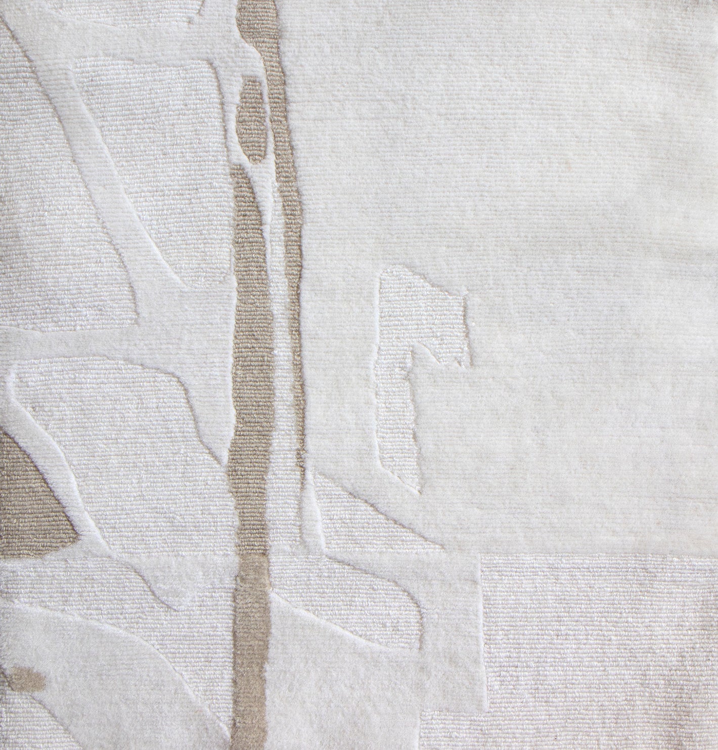 A white piece of cloth with a pattern on it