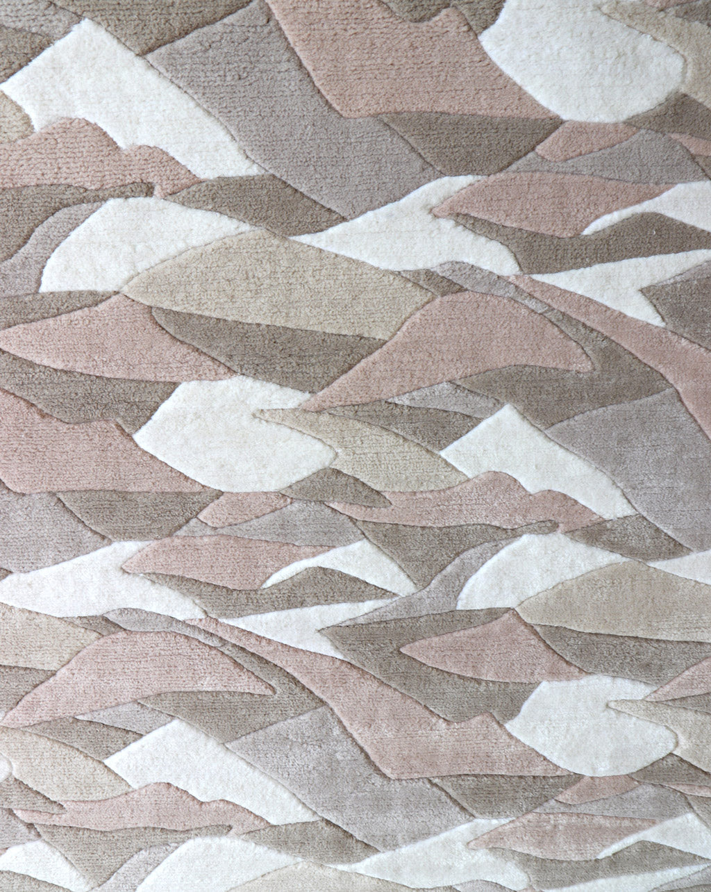 A Mani Hand Knotted Rug made of merino wool with a pattern of mountains on it