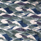 A green and blue fabric with a Mani Hand Knotted Rug Water pattern in different colorways
