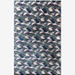 A blue and white camouflage pattern on a white background, resembling rippling Mani Hand Knotted Rug 5' x 8'