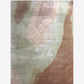 A Progressions Hand Knotted Rug 5' x 8' in the Corinth colorway, featuring a pink, brown, and beige design