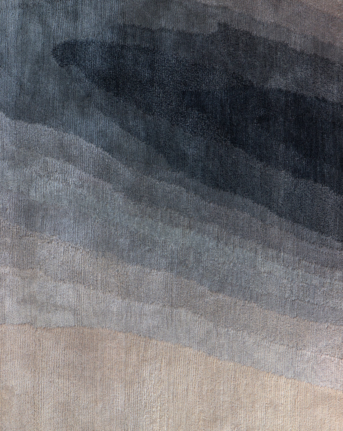 An abstract painting of a wave on a canvas in Progressions Hand Knotted Rug 5' x 8' Gulf colorway