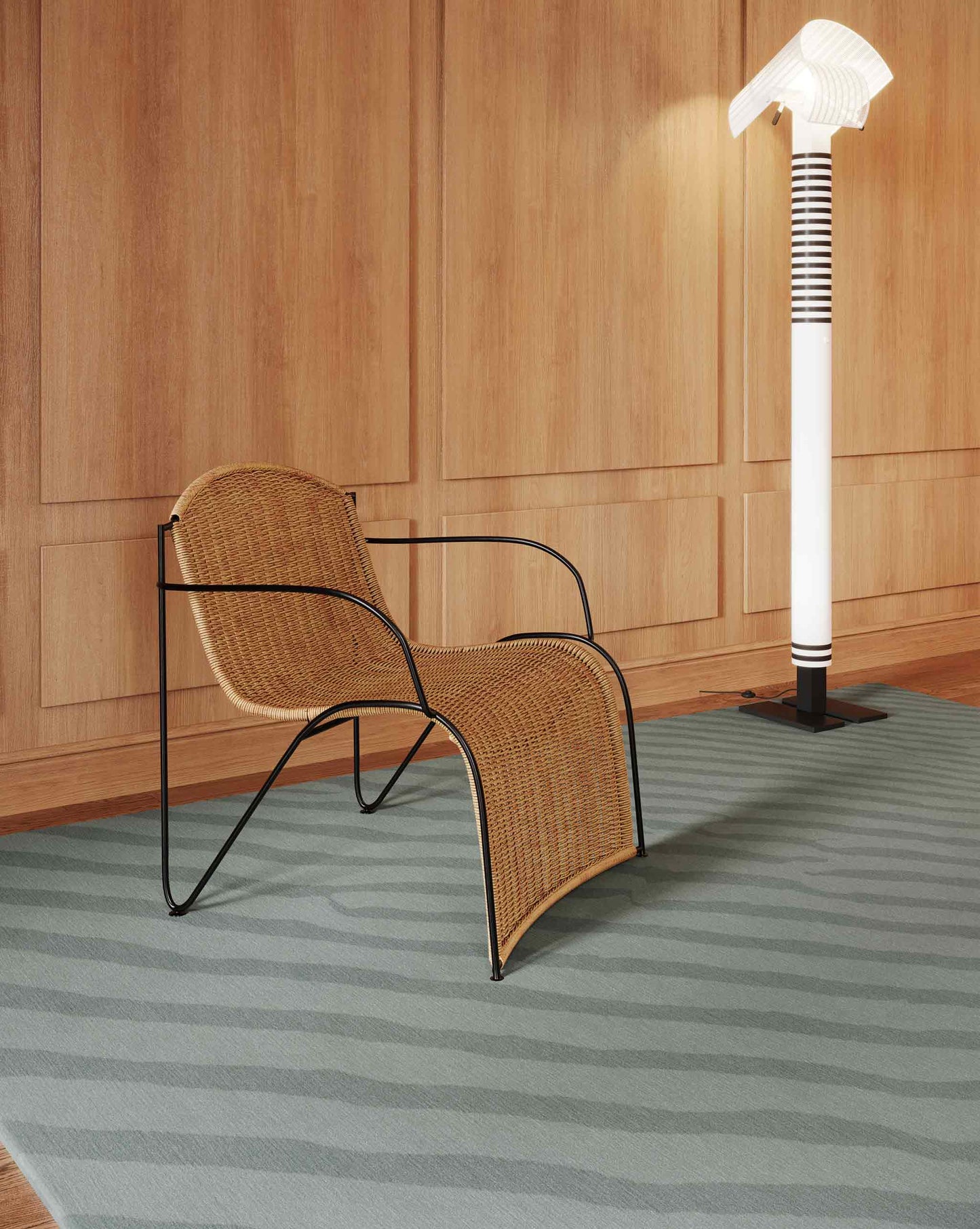Eskayel’s Sand Lines rug in Sage offers a two tone green colorway installed in a living room with a rattan chair and a standing lamp.