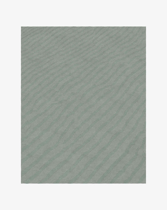 The Sand Lines rug in Sage incorporates two tones of green in soft merino wool.