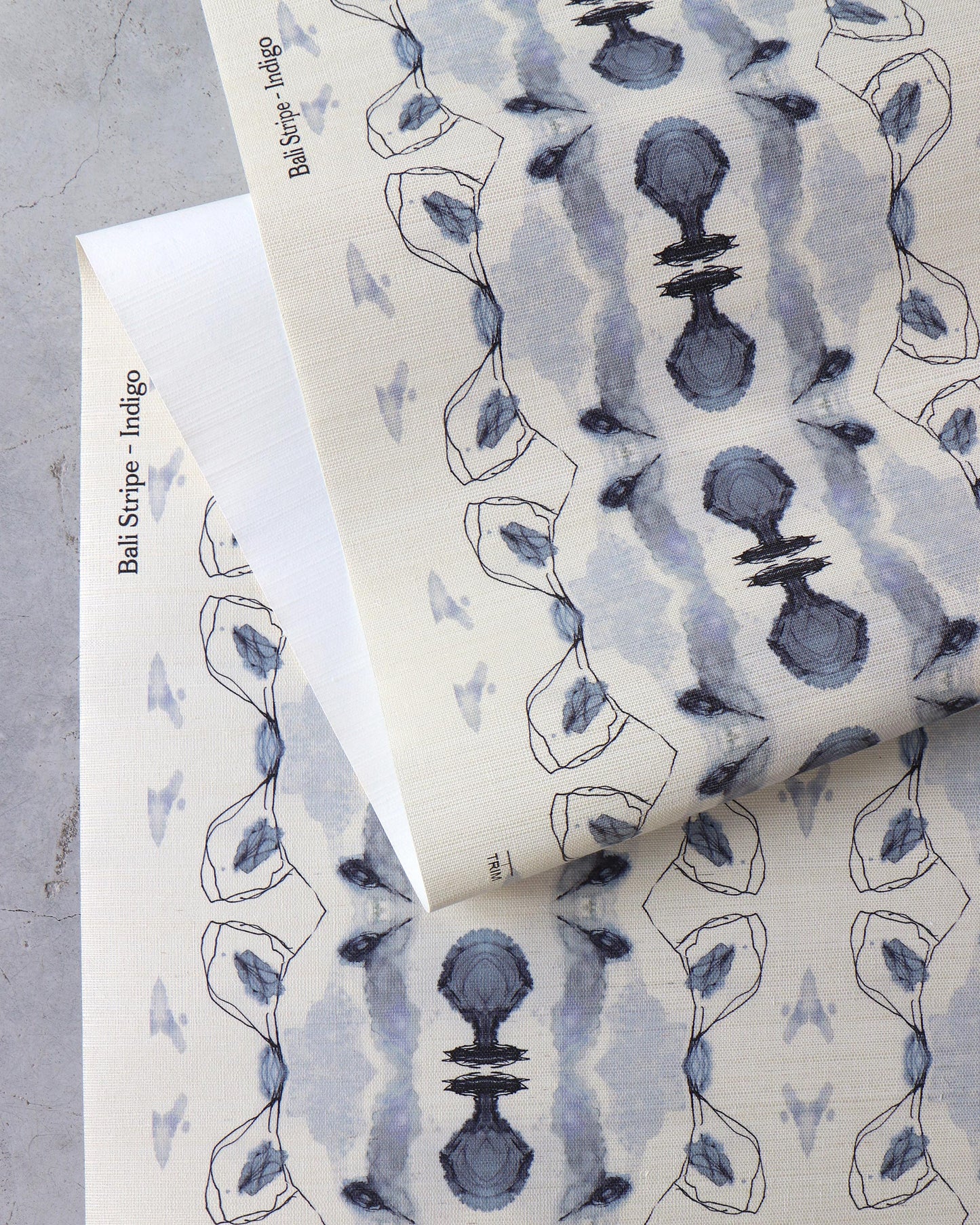 A high-end wallcovering with Bali Stripe Grasscloth and Indigo designs.