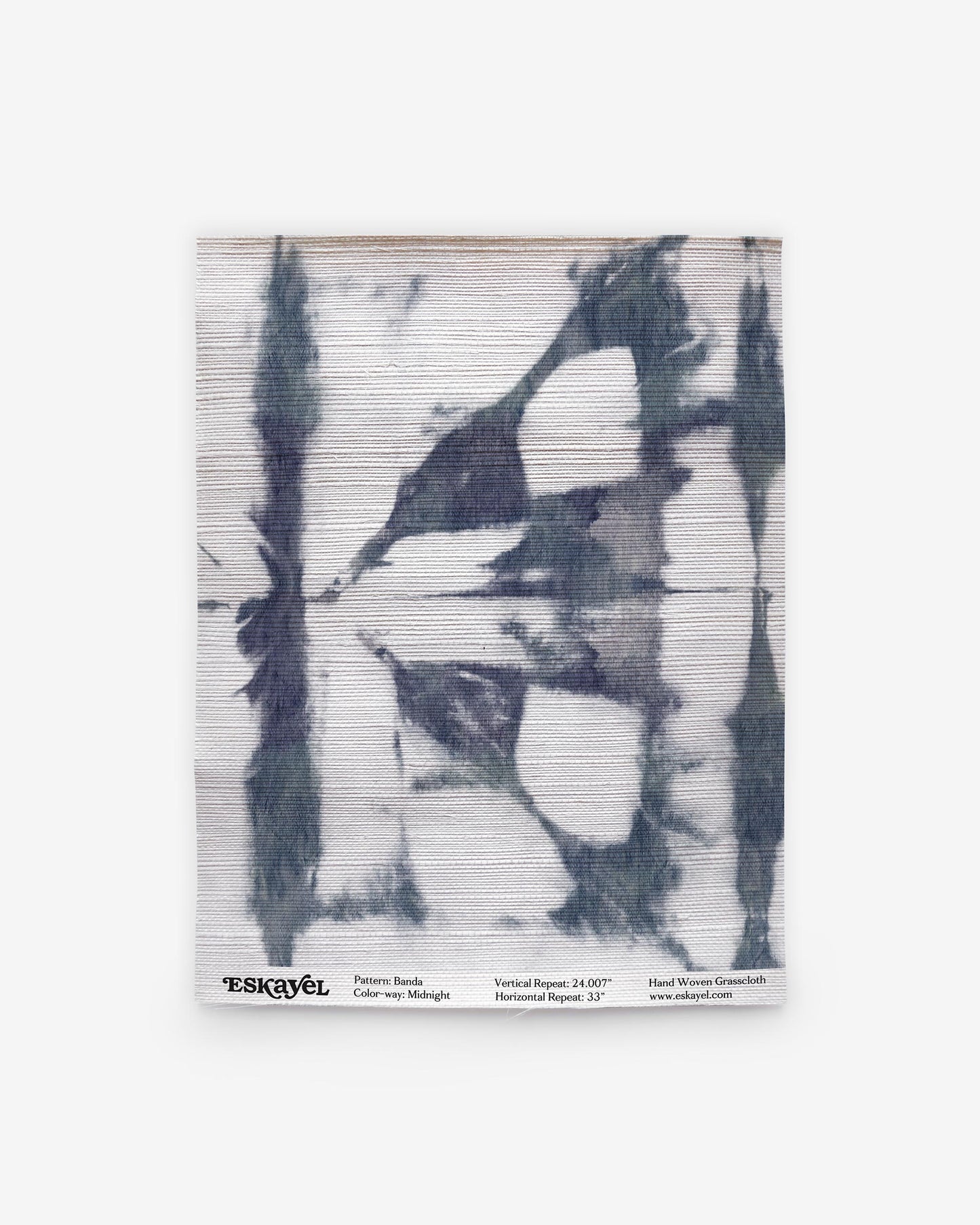 A Banda Grasscloth Sample Midnight pattern on a piece of wallpaper