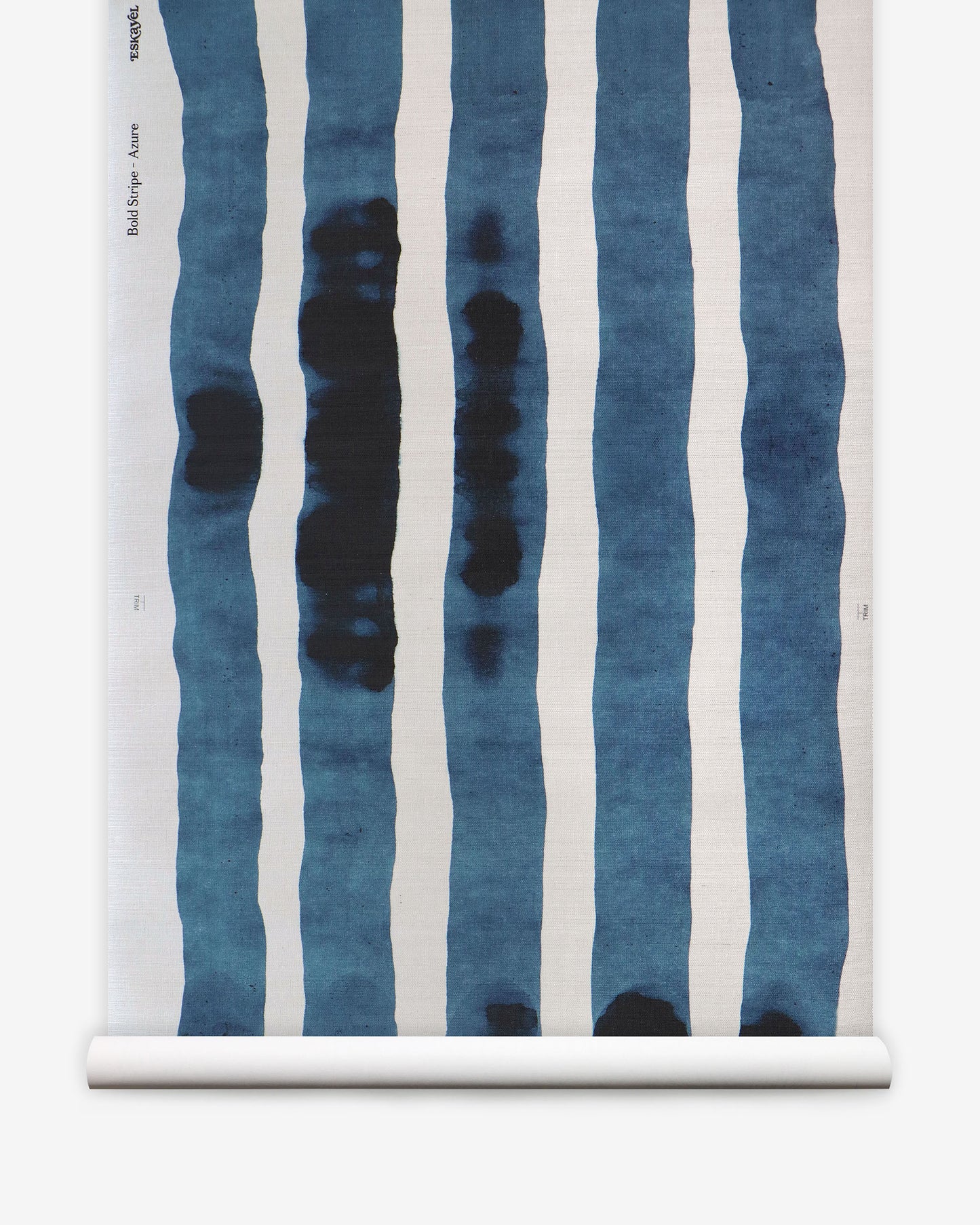 A roll of Bold Stripe Grasscloth Azure, reminiscent of nautical colors
