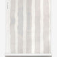 A roll of wallpaper with white and grey stripes from the Bold Stripe Grasscloth Sand collection by Eskayel