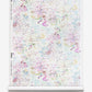 A roll of Bosky Toile Grasscloth Polychrome paper with Polychrome paint splatters on it