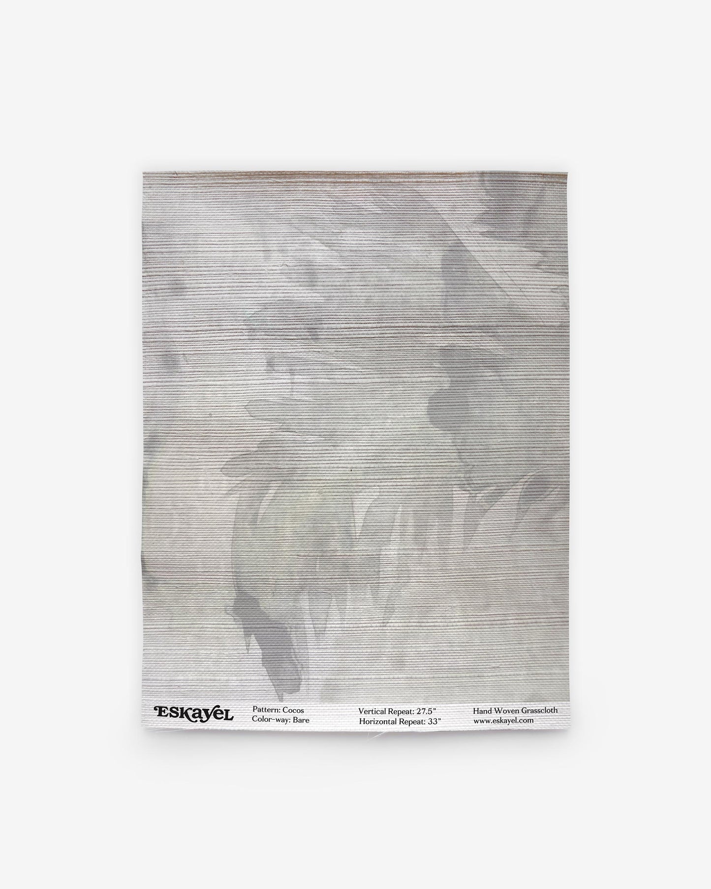 A Cocos Grasscloth Sample Bare with a black and white image on it