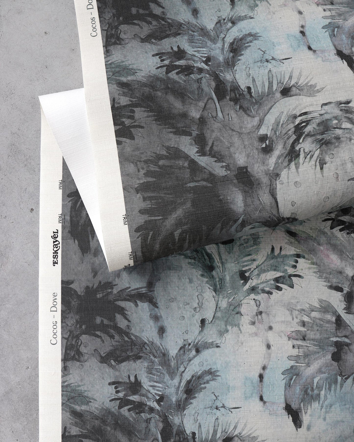 A piece of wallpaper with a black and white pattern on it featuring Cocos Grasscloth Dove luxury grasscloth wallwallpaper