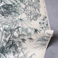 A piece of wallpaper with a drawing of plants from the Domenica Grasscloth Notte pattern in the Salentu Collection