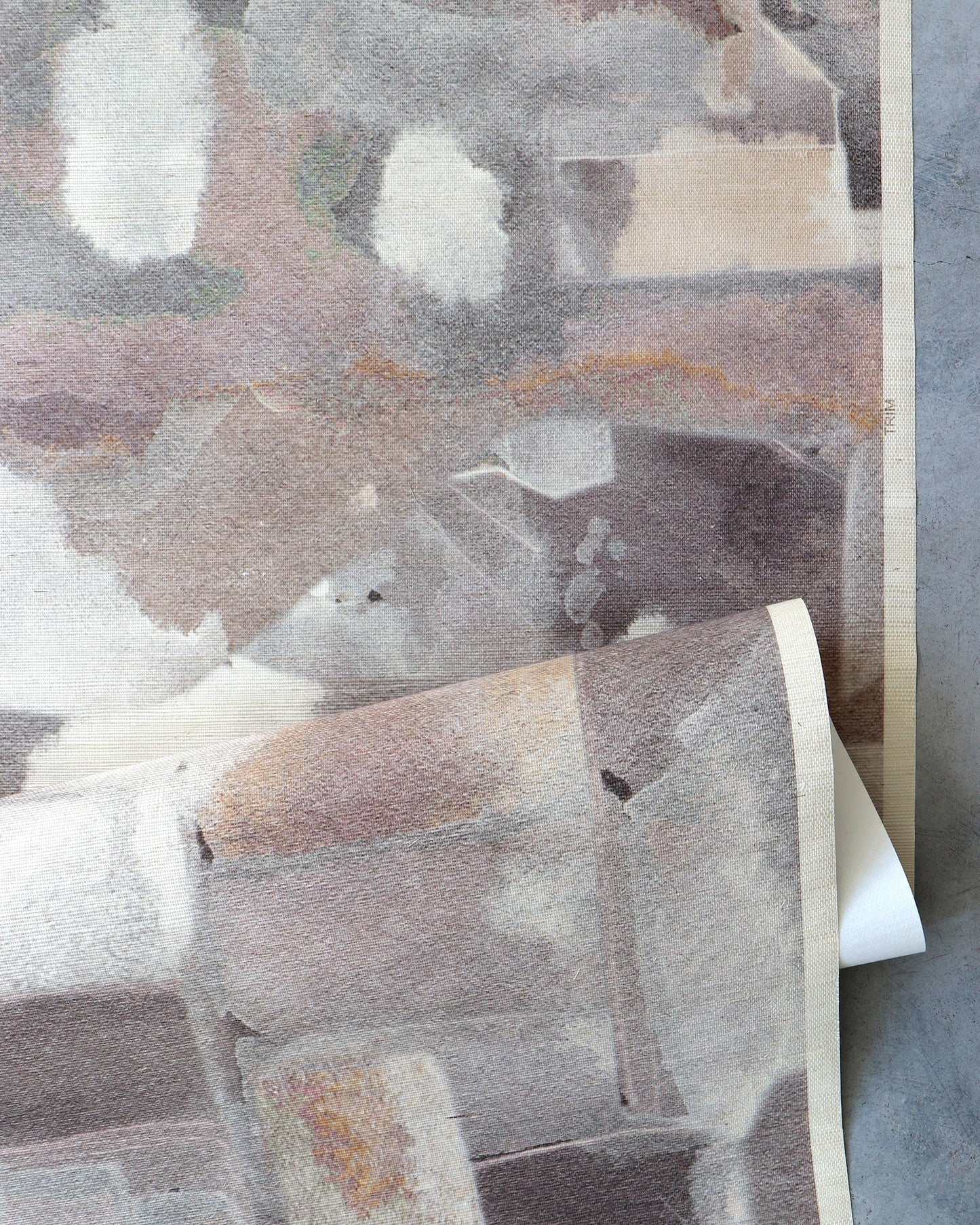 A painting of Medina Grasscloth Pausa roofs on a piece of wallpaper