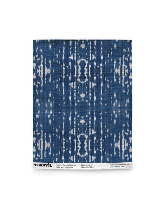 To get an idea of the pattern, an Omaha Kinship Grasscloth Sample Indigo ikat with the indigo and white design on a blue background