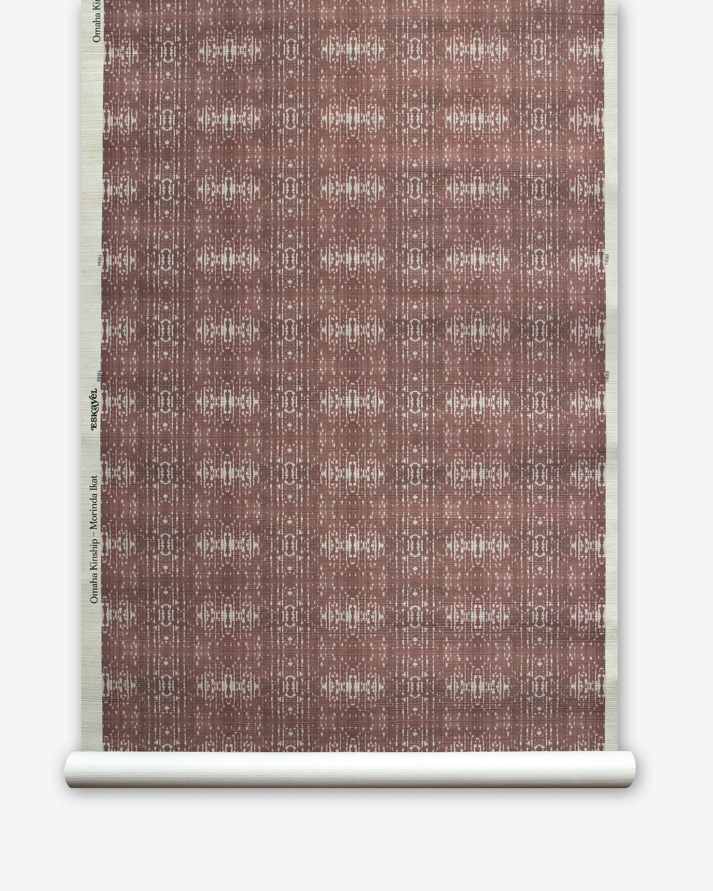 A roll of Omaha Kinship Grasscloth paper with an Omaha Kinship brown and white pattern
