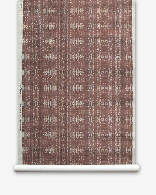 A roll of Omaha Kinship Grasscloth paper with an Omaha Kinship brown and white pattern