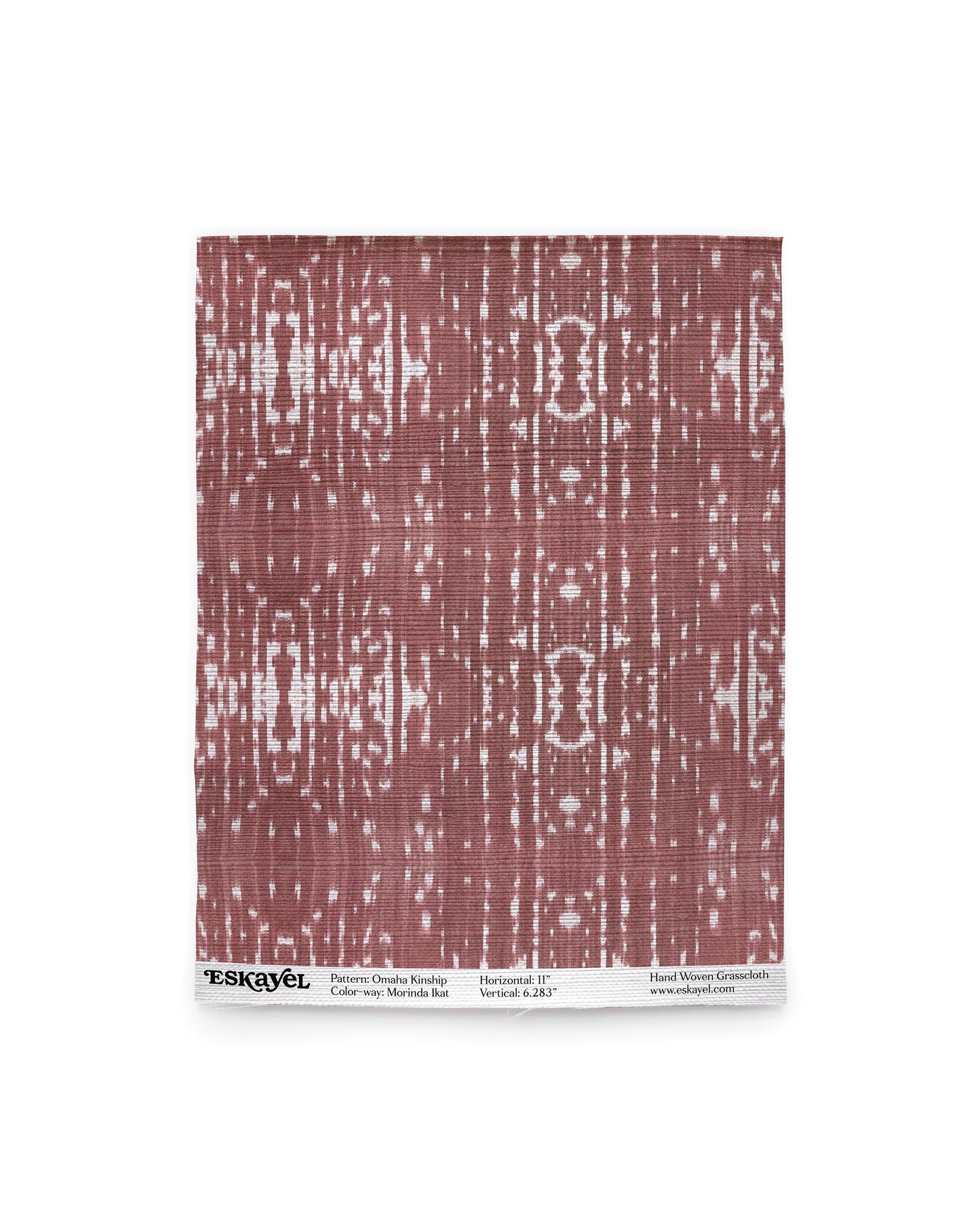 Maroon and white geometric pattern on wallpaper, featuring Omaha Kinship Grasscloth Morinda Ikaton wallpaper