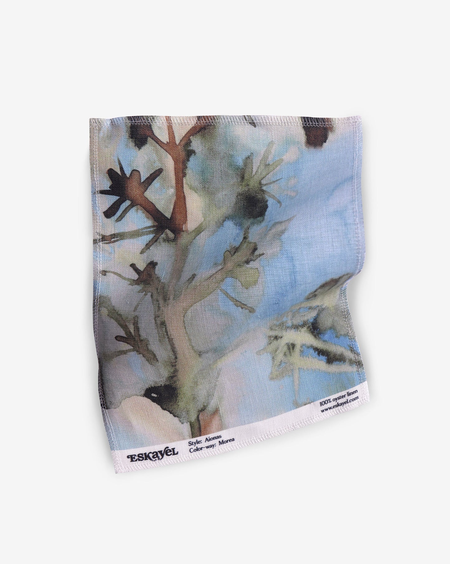 A Aionas Fabric Sample Morea fabric with an image of a tree