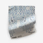 A blue and white Akimbo 2 Fabric with a geometric pattern on it