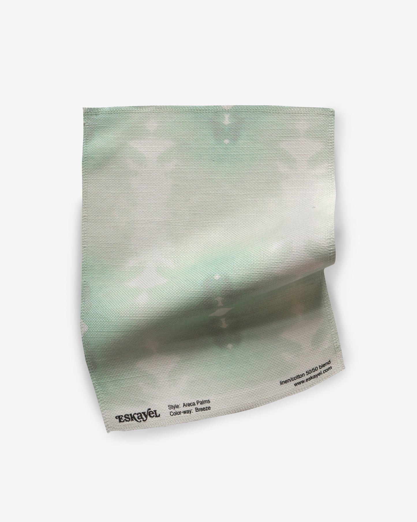 An Areca Palms Fabric Sample Breeze fabric with a pattern on it can be ordered