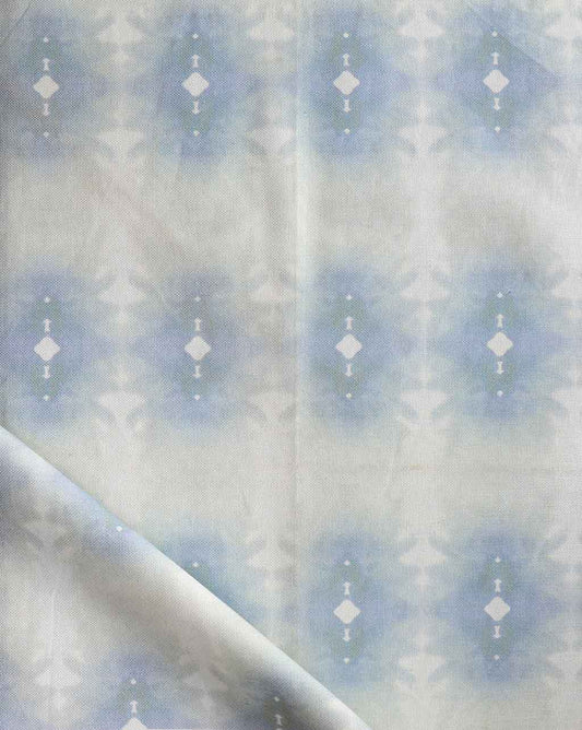 An Areca Palms Fabric Mist, a blue and white fabric with a geometric pattern, inspired by the oceanic art of the Kwoma people from Papua New Guinea