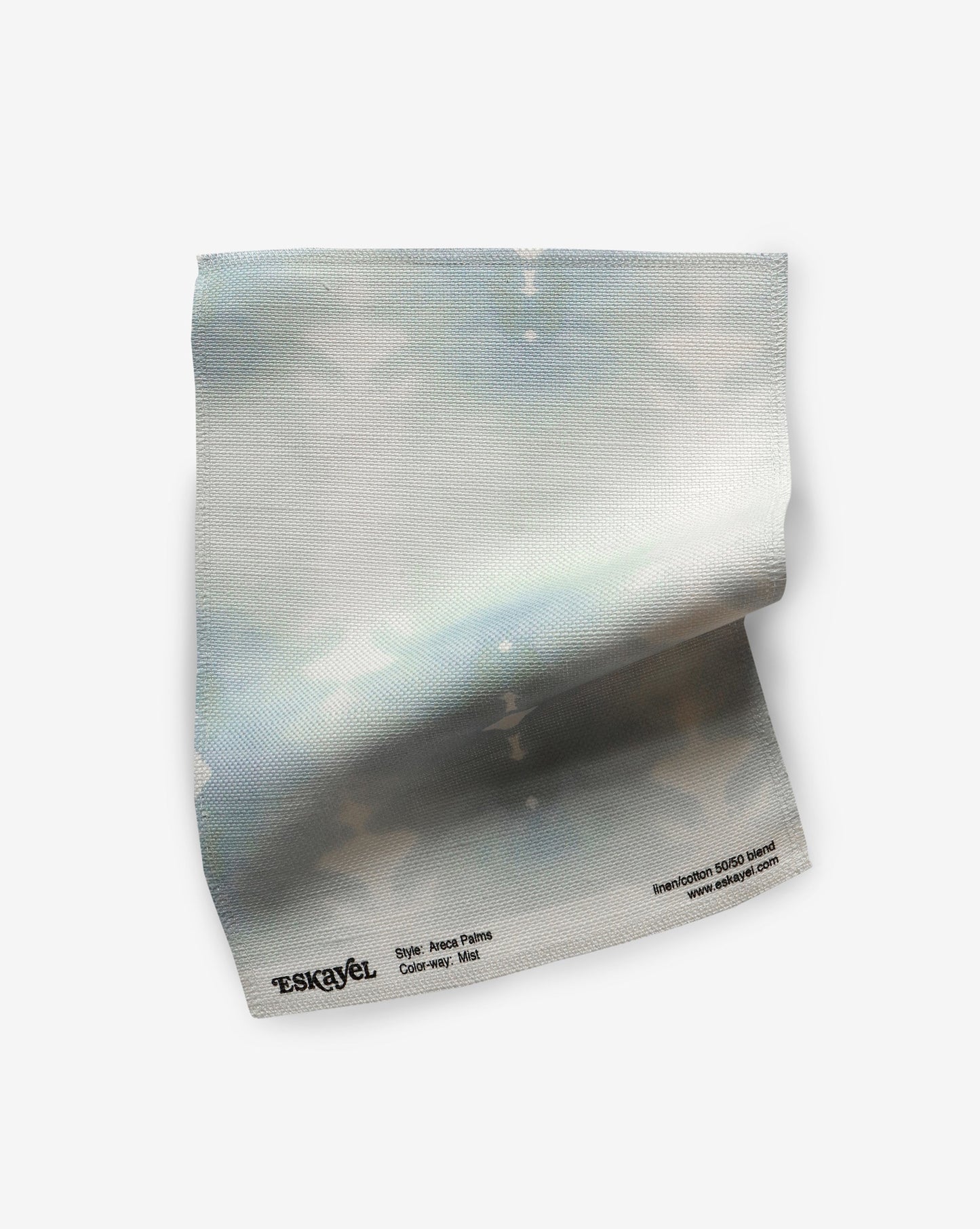 A blue and white patterned Areca Palms Fabric Sample Mist sample