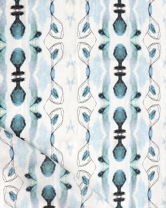 A Bali Stripe Fabric Sky Blue with an abstract design inspired by nature