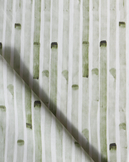 A close up of a high-end Bamboo Stripe Fabric Brush