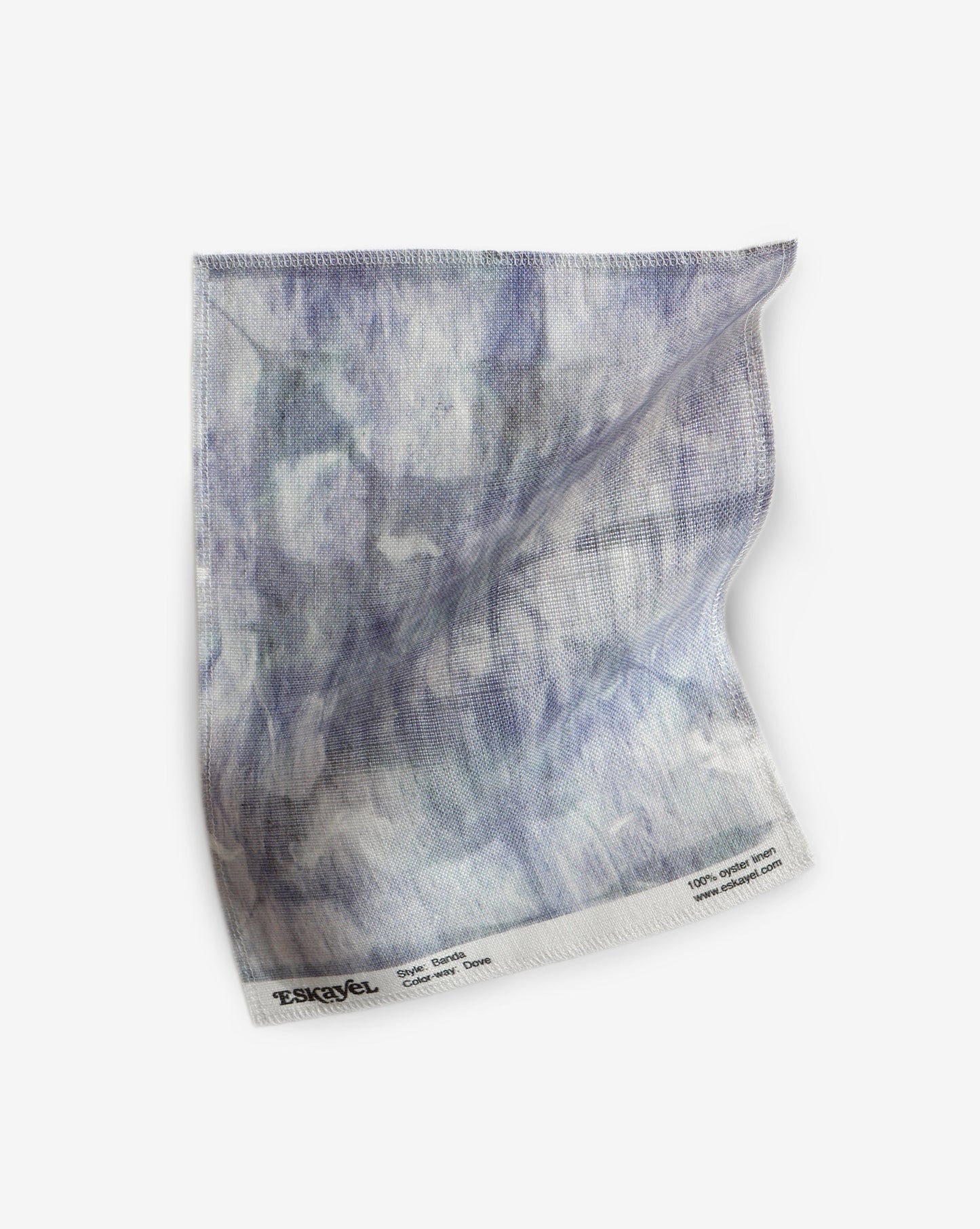A piece of Banda Fabric Dove with a tie-dye technique and a blue and white pattern on it
