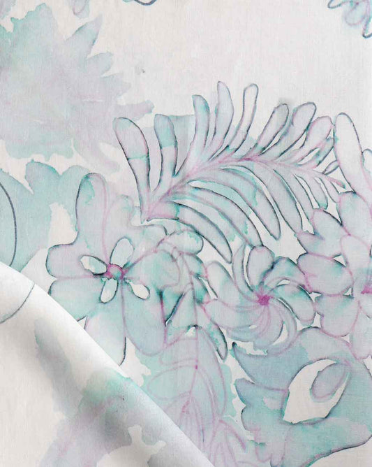 A close up of a Belize Blooms Fabric Jardin floral pattern on luxury wallpaper