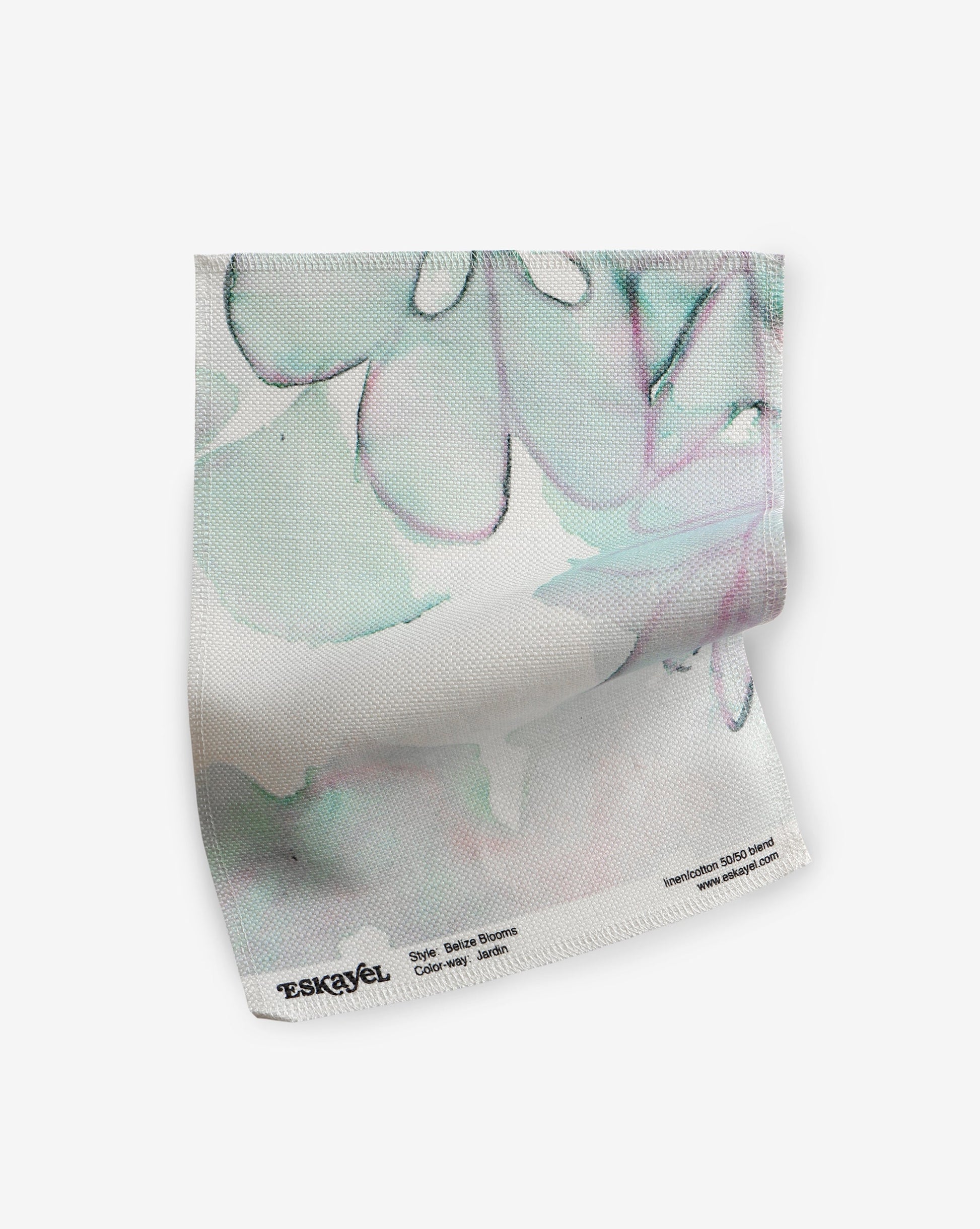 A Belize Blooms fabric hand fabric with a floral design on it